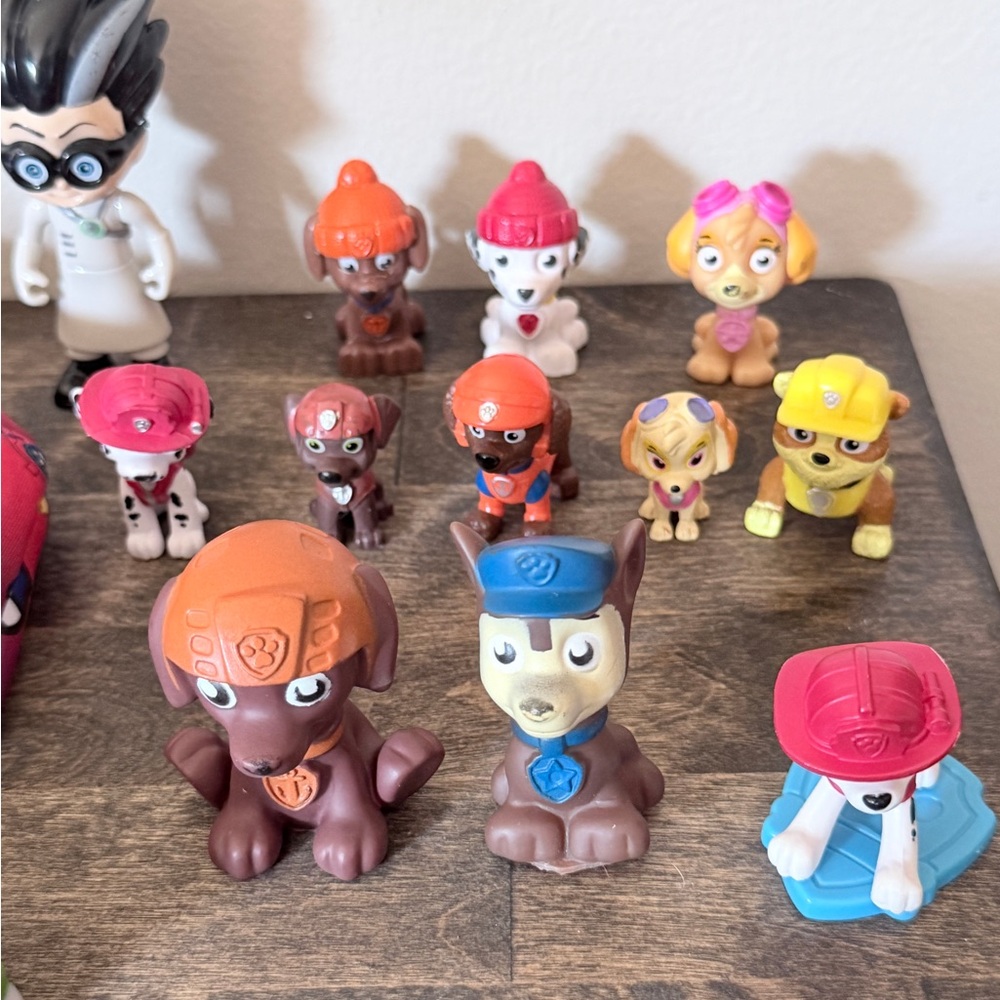 Paw Patrol Mixed Character Figure Lot in Brown, Orange, Pink, Yellow, Blue, Red